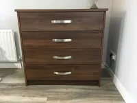 Dark wood set of drawers.